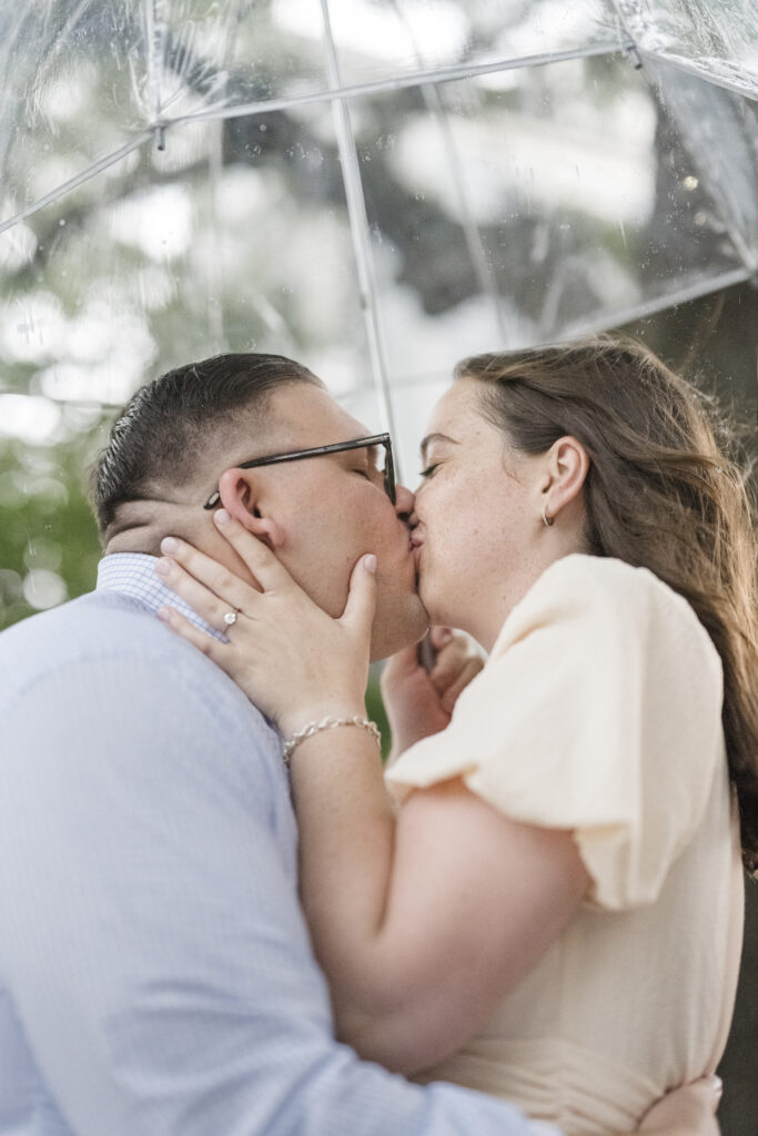 charleston engagement in the rain
