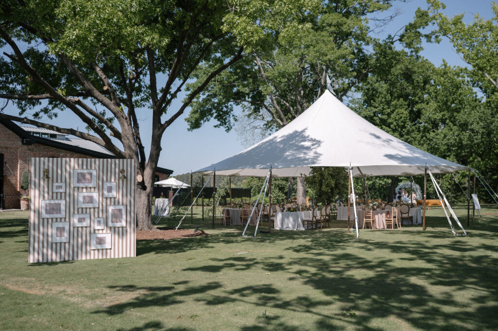 White tent wedding reception space