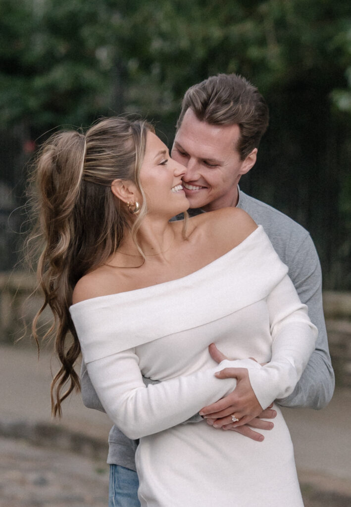 couple poses for engagement photos