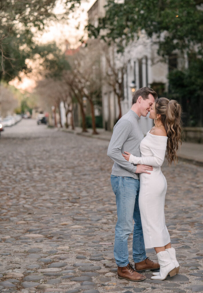couple poses for engagement photos