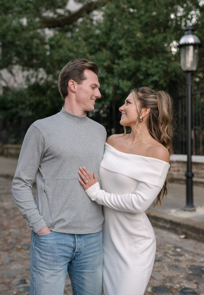 couple poses for engagement photos