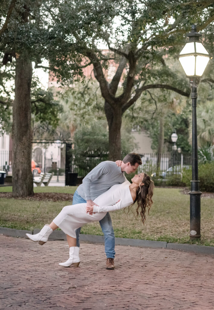 couple poses for engagement photos